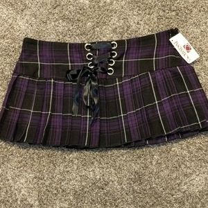 Plaid skirt w/fishnet stockings